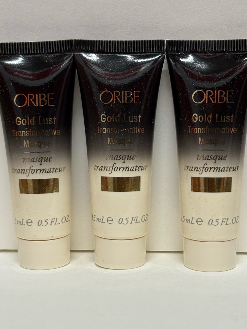 Oribe Gold Lust Transformative Masque - Black and Cream Tubes